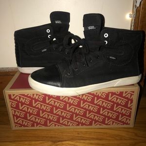 women’s black Vans high tops